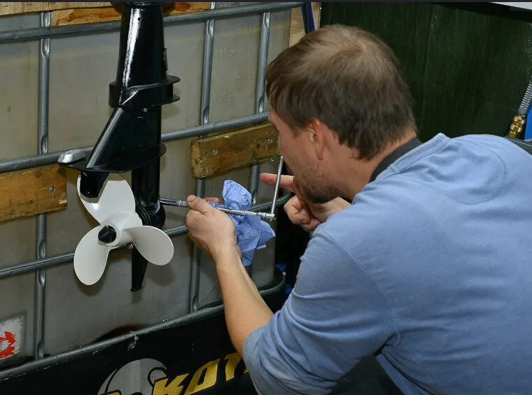 Boat engine inspection at a Greek marina